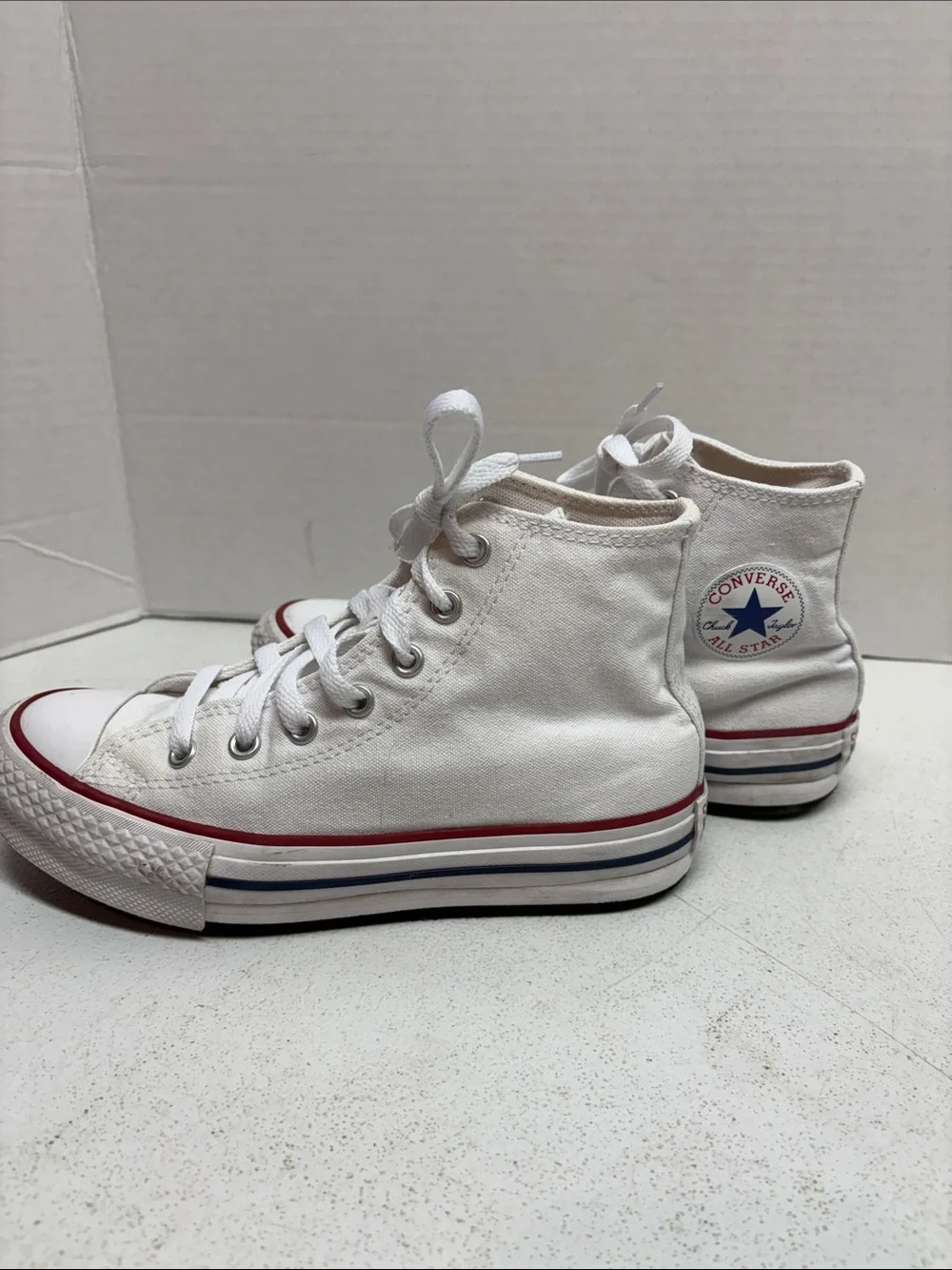 Converse White High Top Sneakers with Red and Blue Stripes